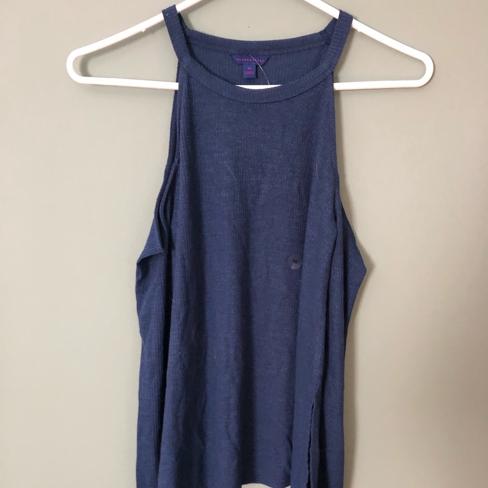 No shoulder blue long sleeve shirt.